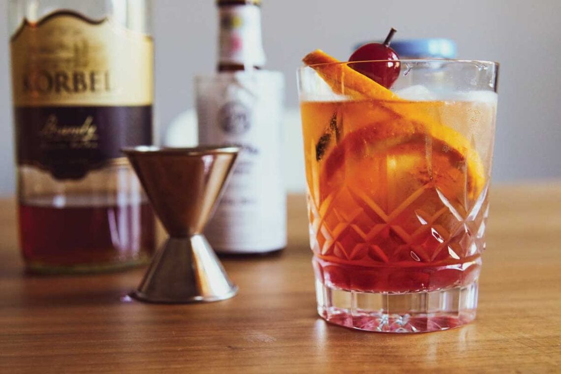 Brandy Old Fashioned Sweet with Ingredients in Crystal Glass