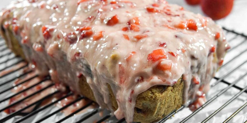 Gluten Free Dairy Free Strawberry Bread with Glaze on Cooling Rack