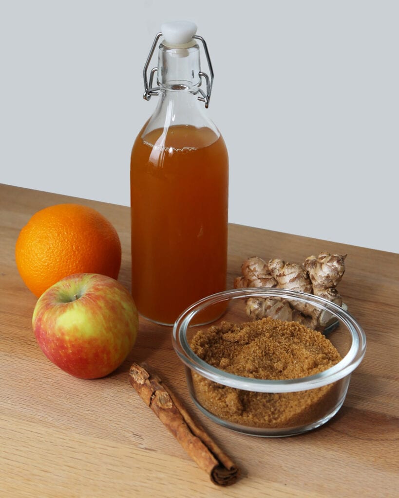 Apple Cider Mocktail Ingredients - Apple Cider, Ginger, Brown Sugar, Orange, Apple, Cinnamon Stick