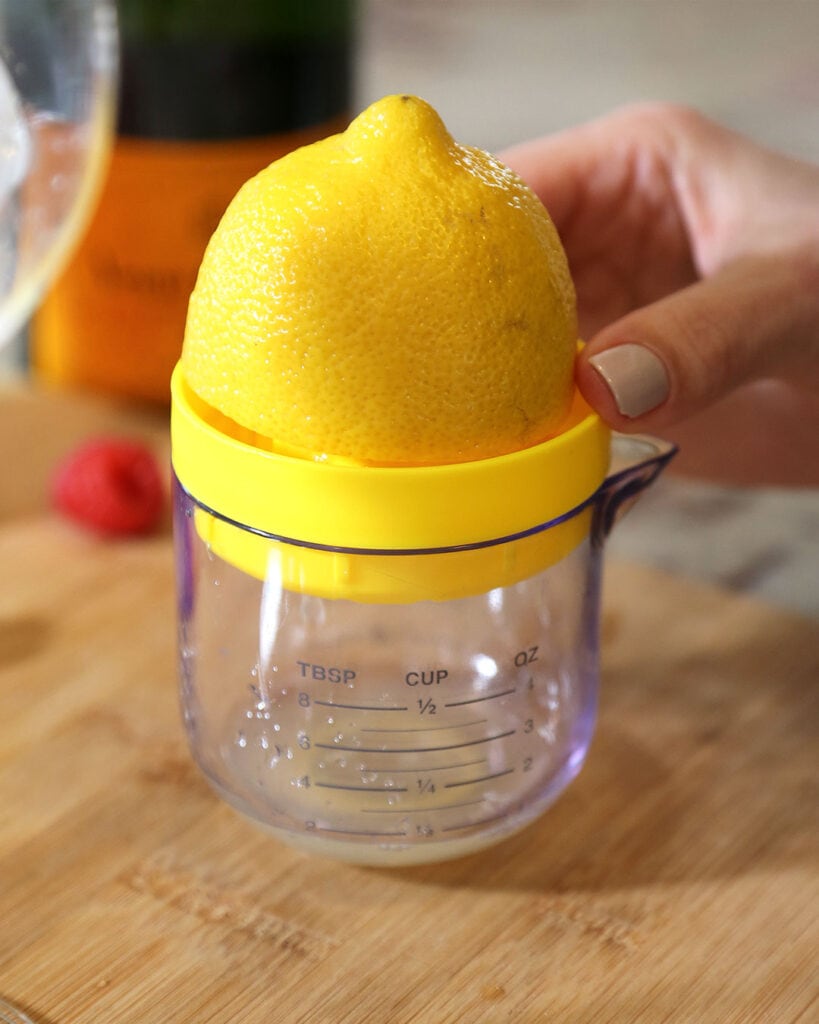 Lemon on Citrus Juicer with Cup
